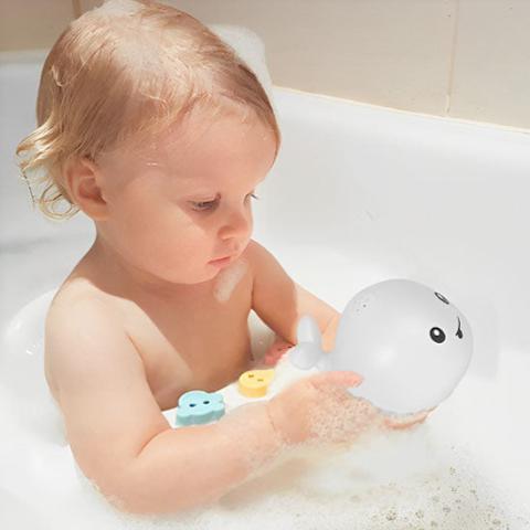 Jeu de bain en forme de baleine avec jets d'eau et lumières pour la baignoire